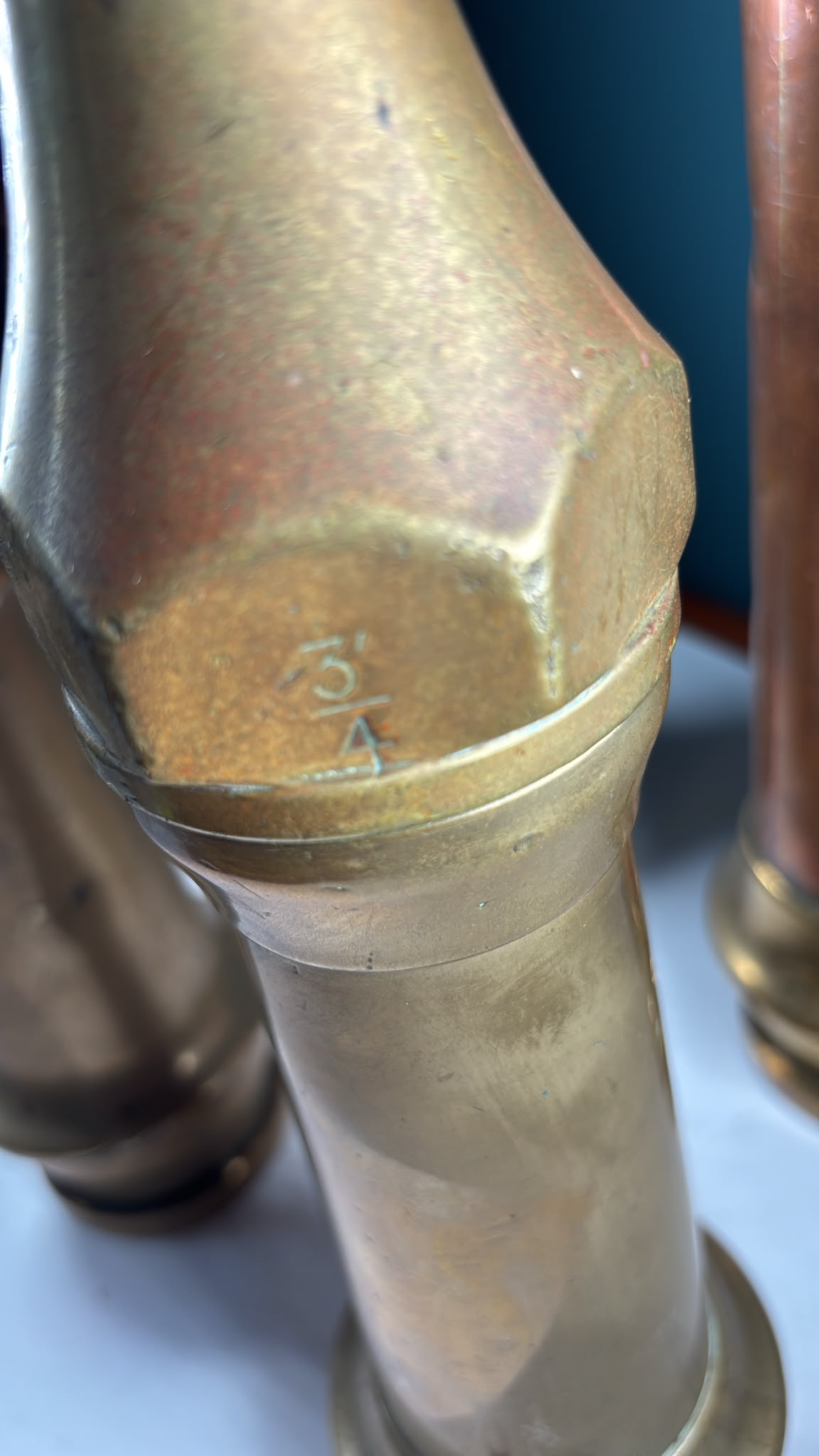 Image of 4 vintage copper and brass fire hose nozzles