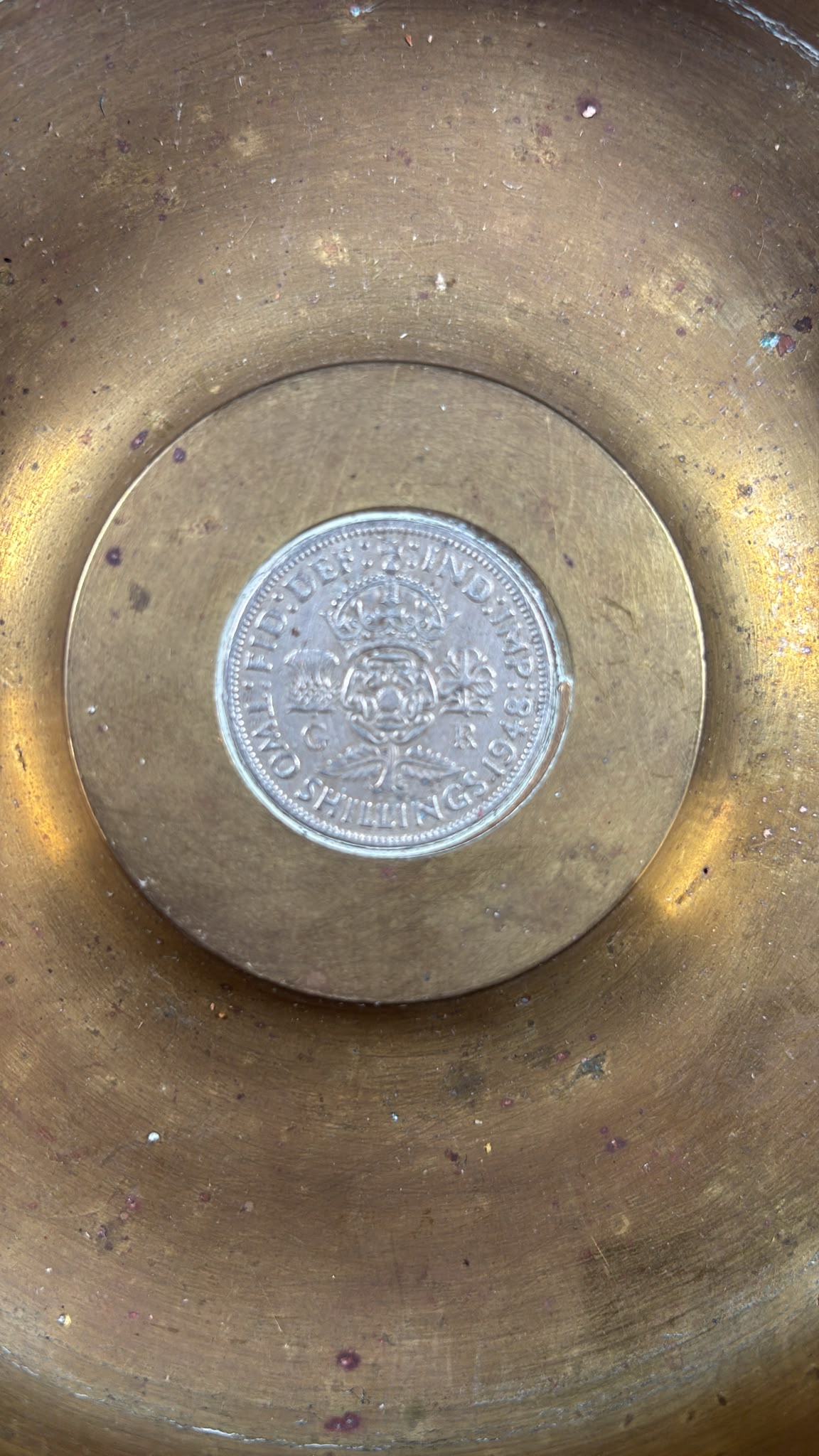 Image of A very heavy brass shell casing for use as a small dish or ashtray