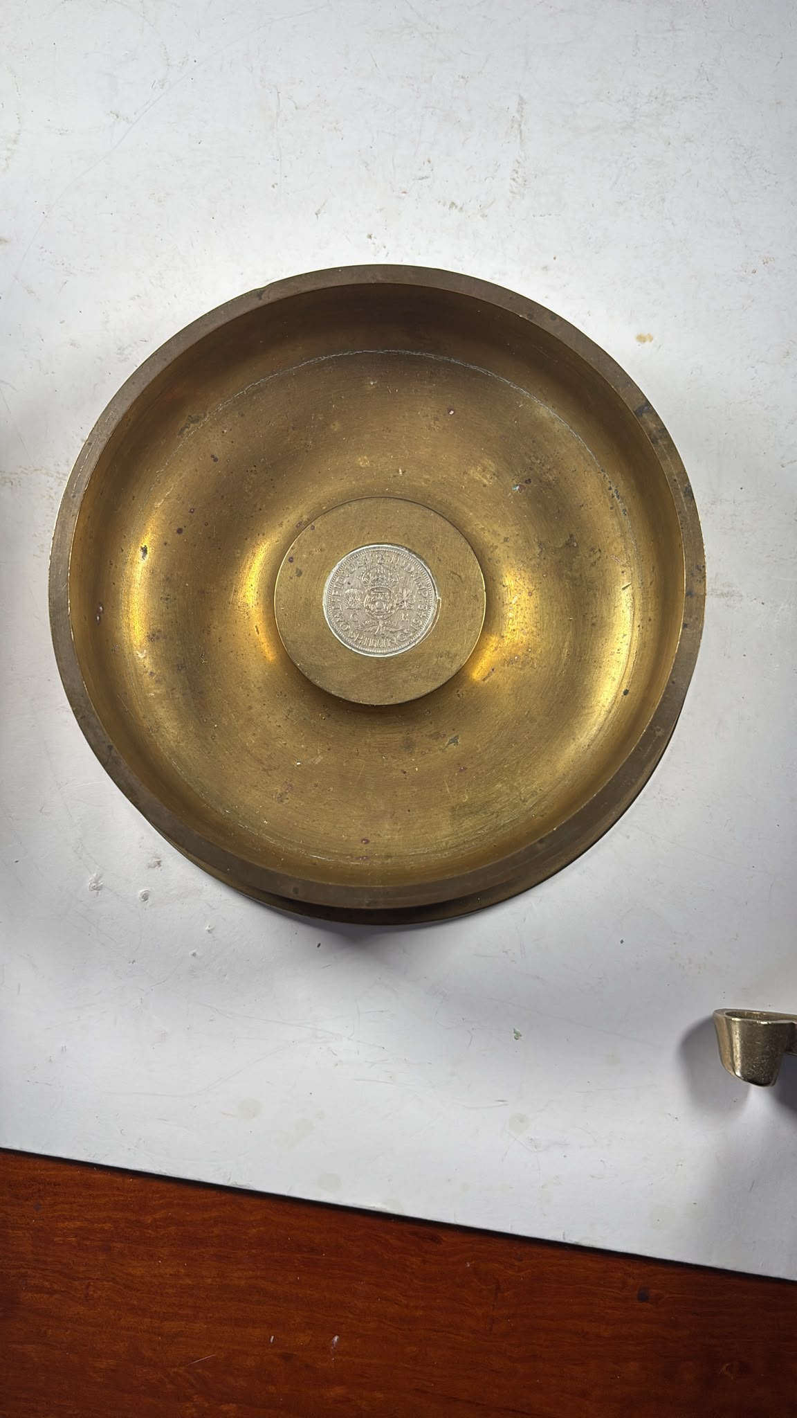 Image of A very heavy brass shell casing for use as a small dish or ashtray