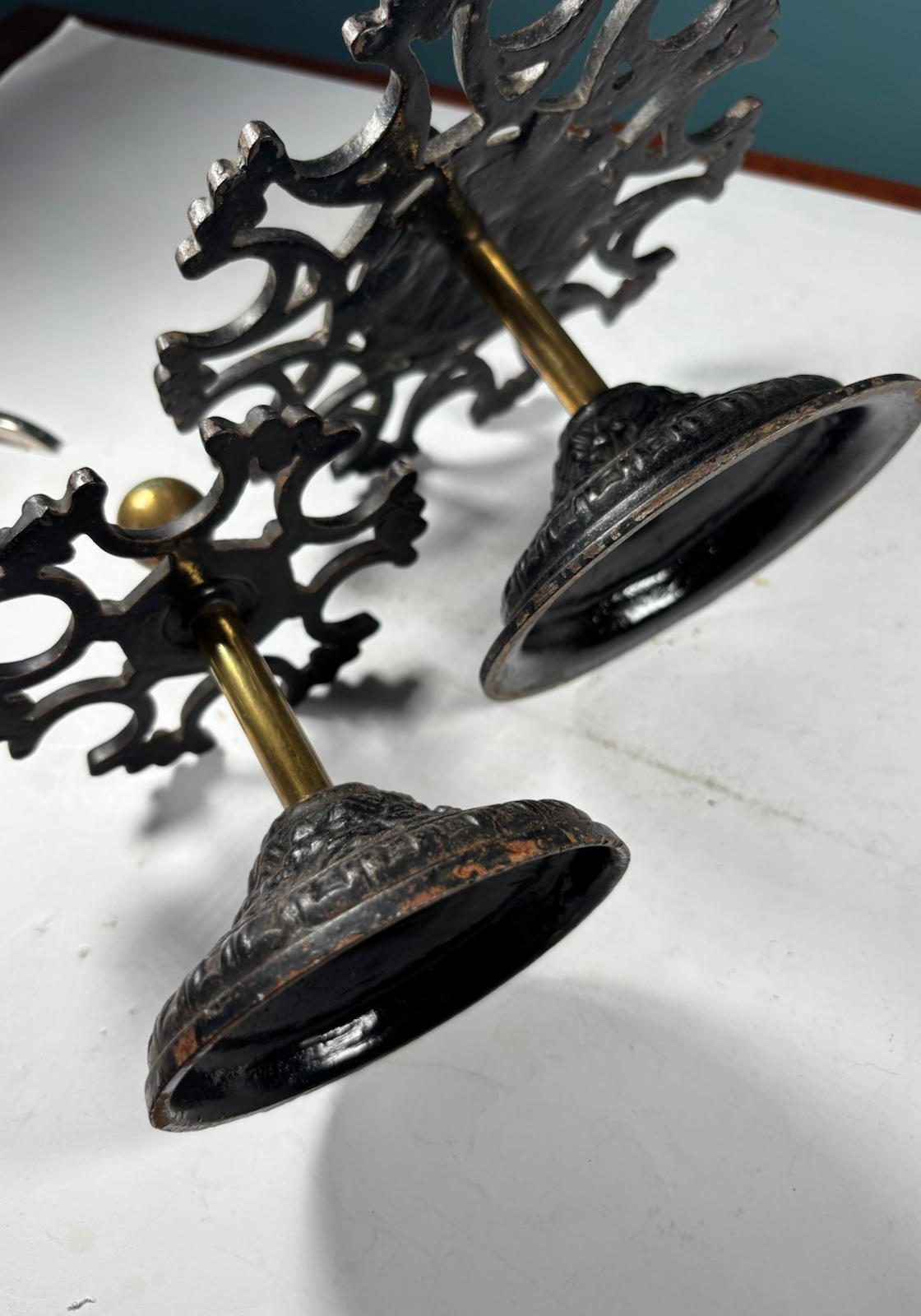 Image of 2 vintage desktop stamp holders made of cast iron