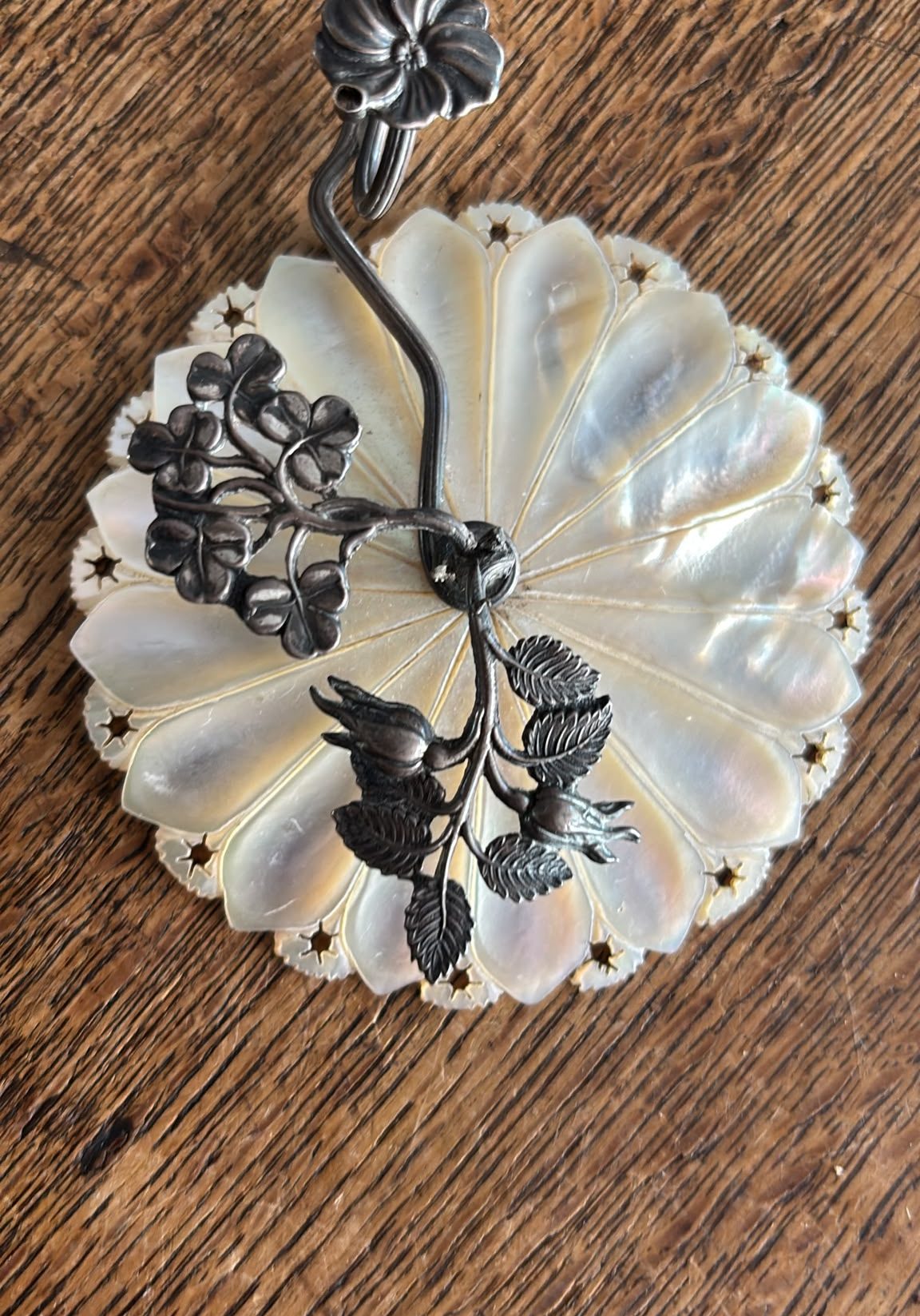 Image of Mother of pearl base with 3 silver branches. Very pretty