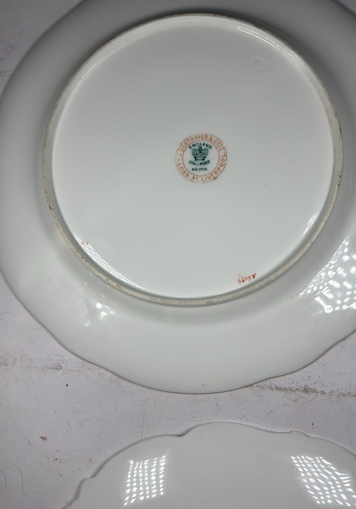 Image of base of Two Coalport antique plates from 1828
