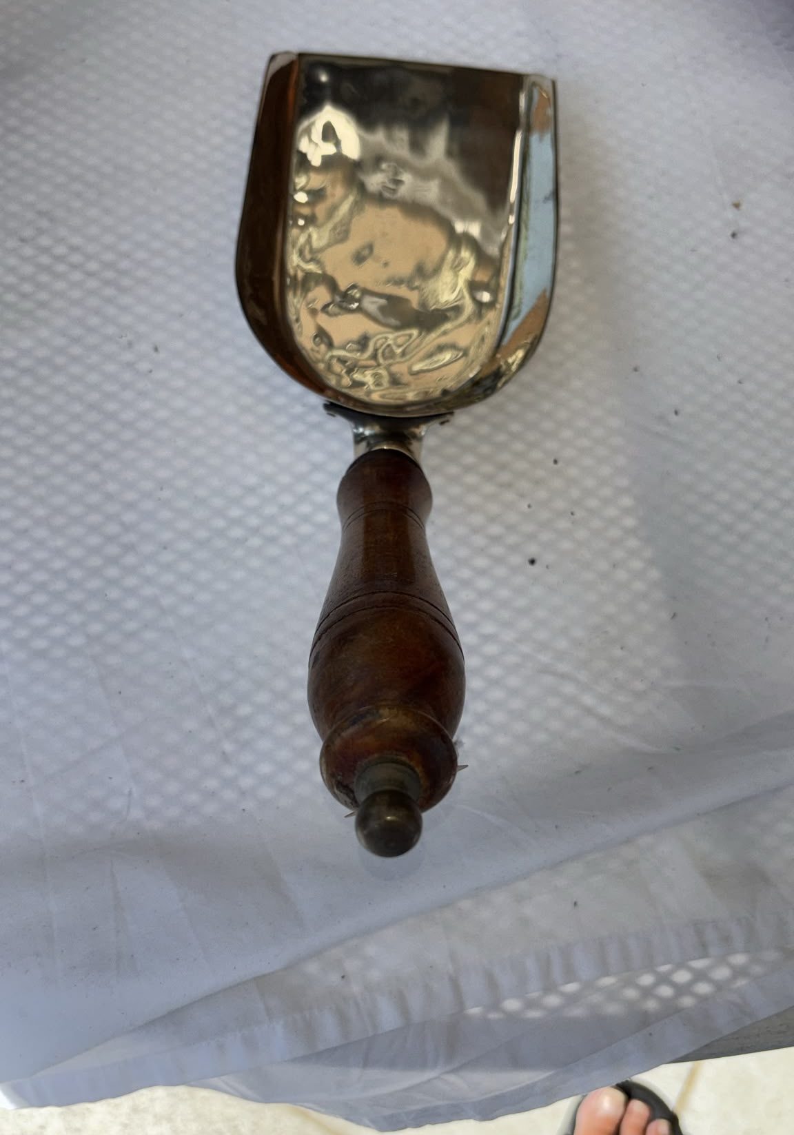 Image of Brass scoop or shovel with a wooden handle