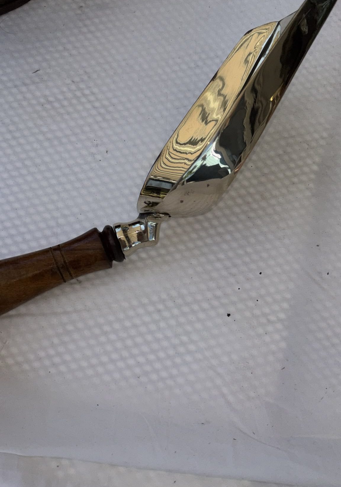 Image of Brass scoop or shovel with a wooden handle