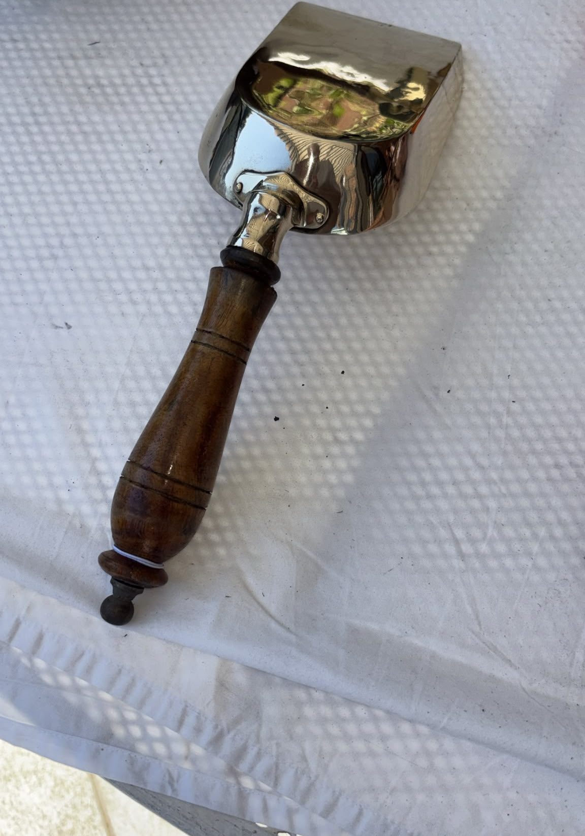 Image of Brass scoop or shovel with a wooden handle