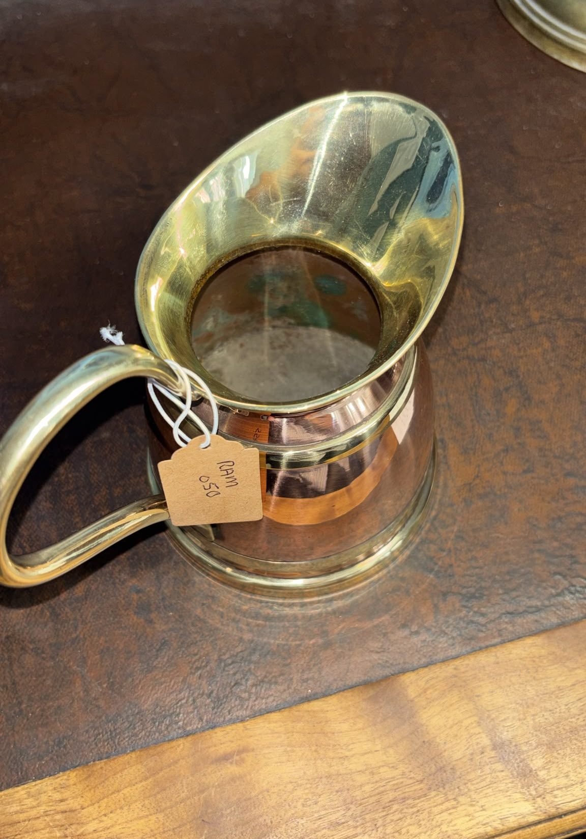 Image of small tankard fashioned from copper and brass