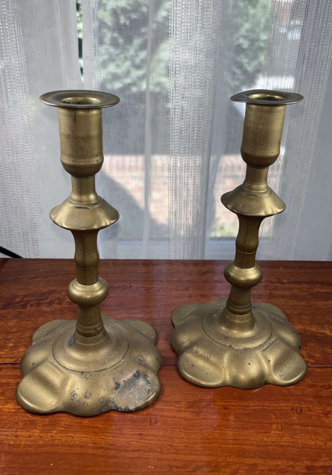 Image of A pair of George the second brass candlesticks circa 1760