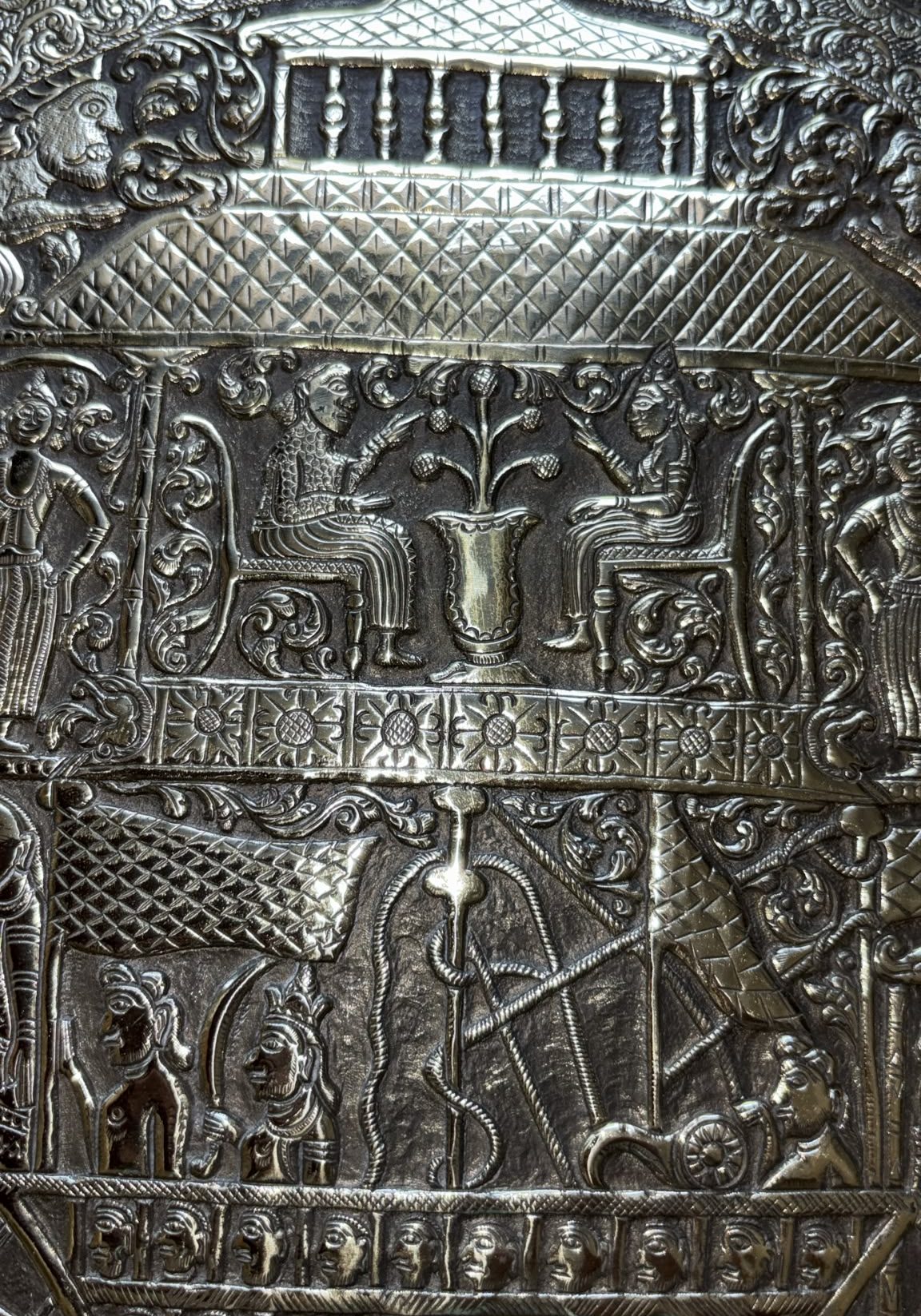 Image of solid brass wall plate made in Persia around 1945. It depicts Noah’s Ark