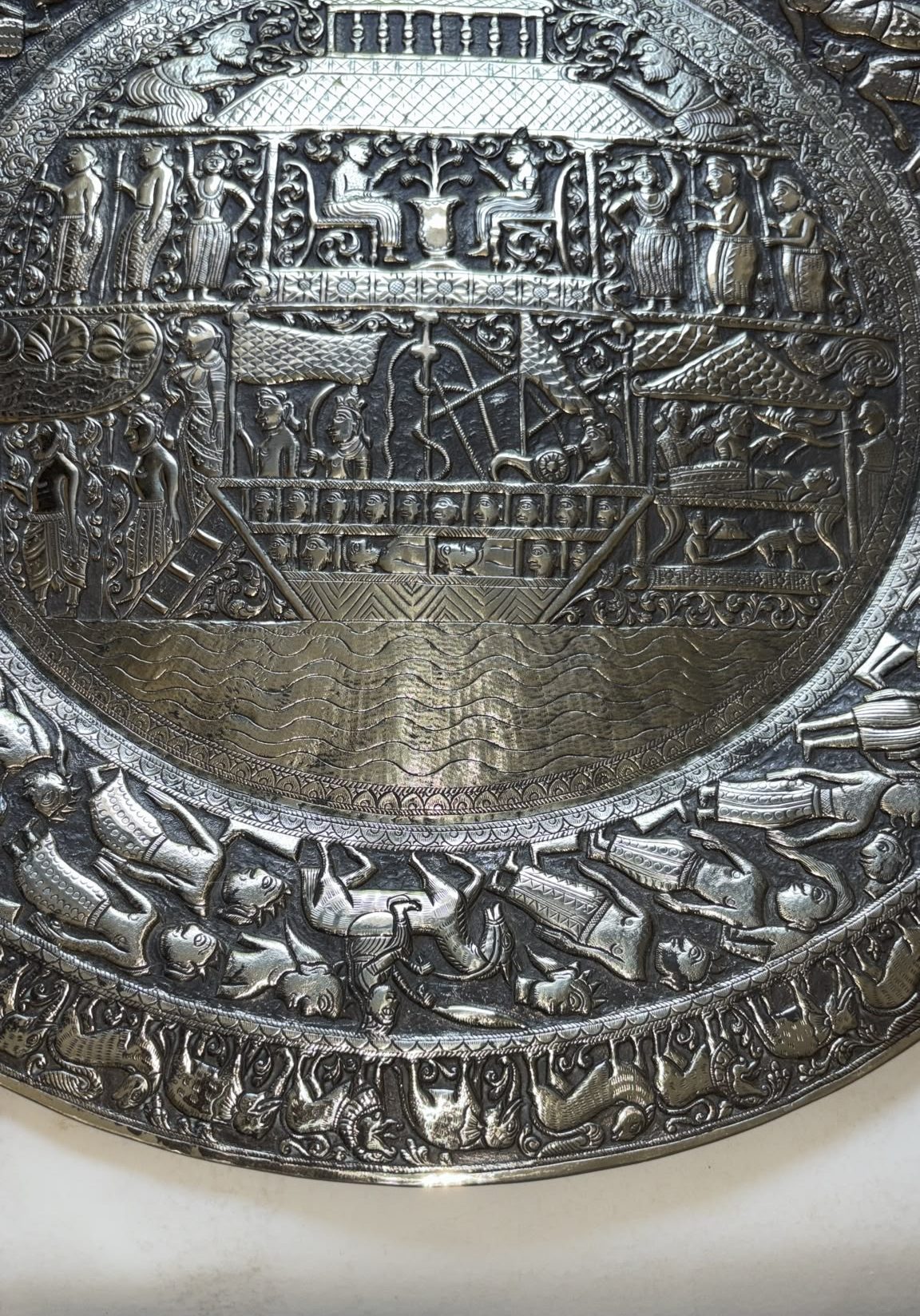 Image of solid brass wall plate made in Persia around 1945. It depicts Noah’s Ark