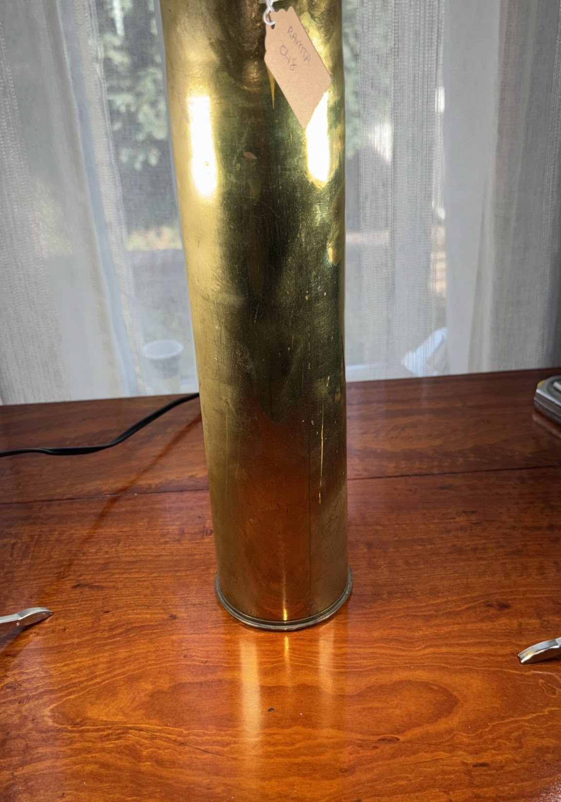 Image of brass vase fashioned from an artillery shell