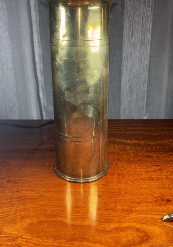Image of Flared top brass shell vase from 1916