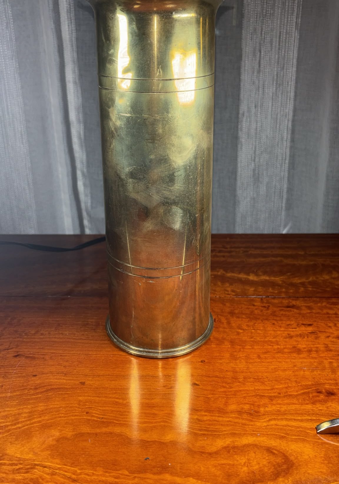 Image of Flared top brass shell vase from 1916