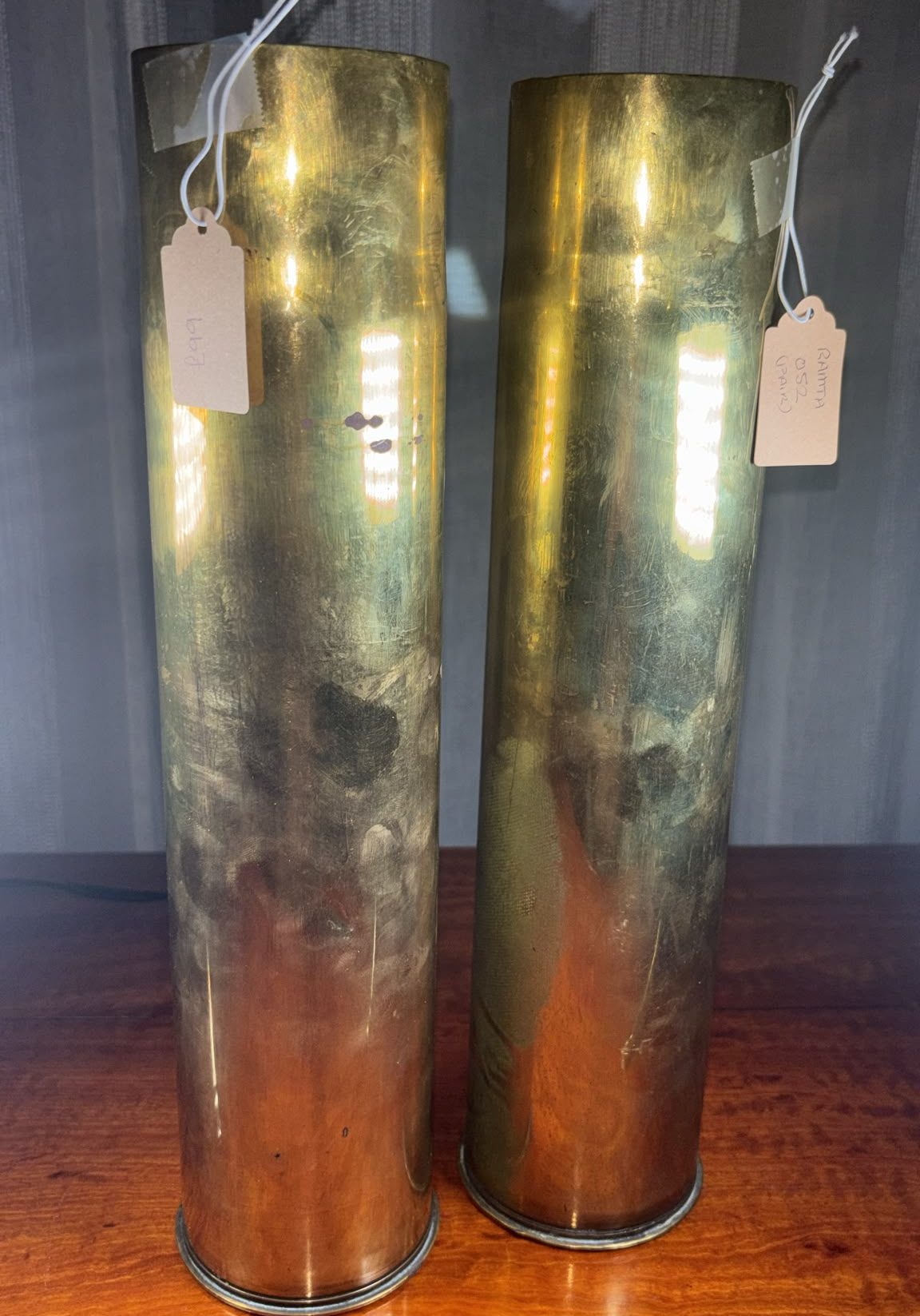 Image of tall brass vases from WW1